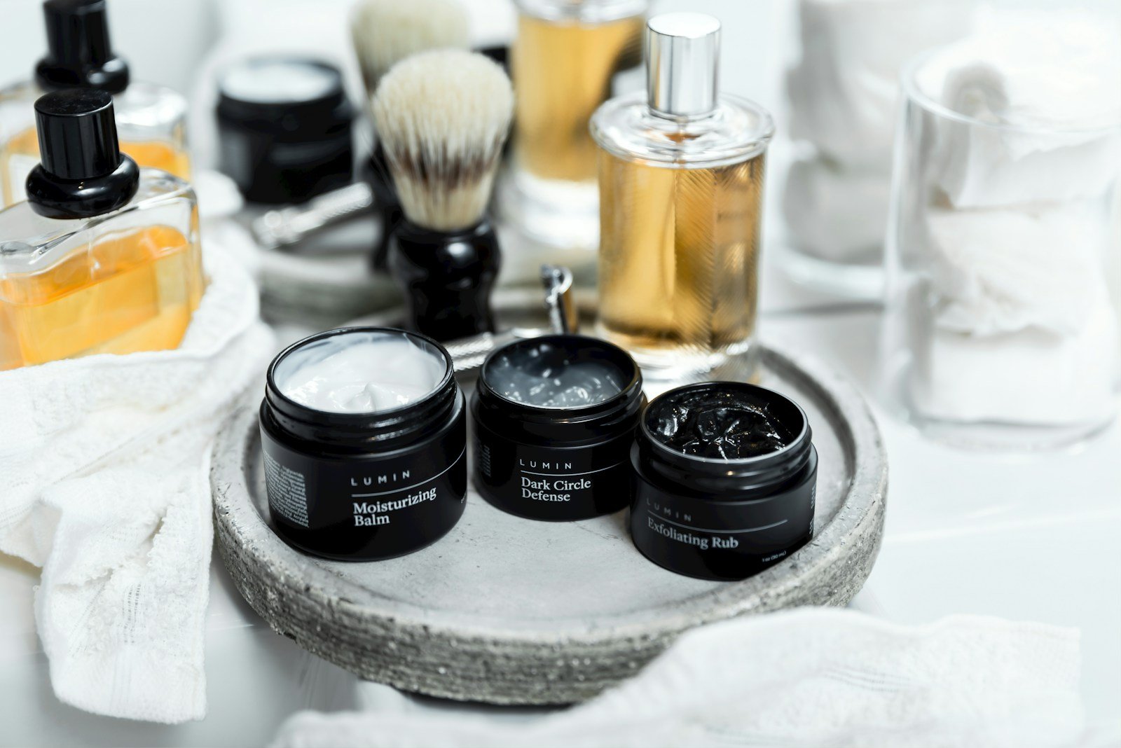 a table topped with different types of shave products